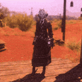 a girl with horns is standing on a wooden deck in the desert