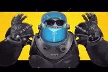 a robot is wearing sunglasses and a helmet that says rod on it