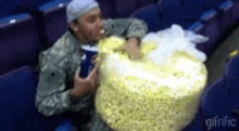 popcorn eating hungry chilling watching