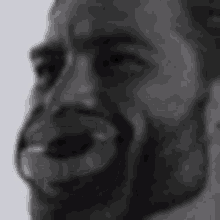 a black and white photo of a person 's face with a pixelated pattern on it .