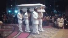 pallbearers casket coffin funeral dancing