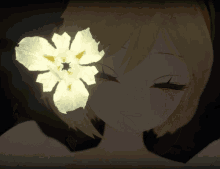 a girl with a flower in her hair is smiling
