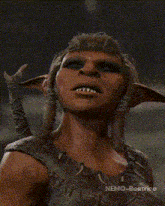 a close up of a person 's face with the name nemo-beatrice on the bottom