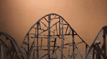 a roller coaster without riders going up the hill