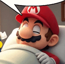 mario is laying in a hospital bed with a speech bubble above his head
