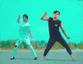 a man and a woman are dancing barefoot on the road