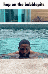 a man swimming in a pool with the words hop on the bubblepits above him