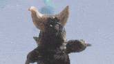 a monster is being struck by lightning and has a green light coming out of its eyes
