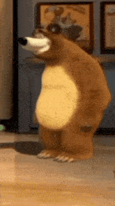 a cartoon bear is standing on a wooden floor in front of a wall .