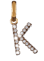 a gold letter k is surrounded by diamonds