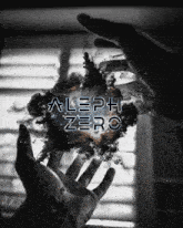 a black and white photo of a person 's hand reaching out towards a cloud that says aleph zero