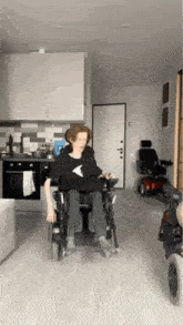 Wheelchair Kid Spins Around With Orange Hair GIF - Wheelchair Kid Spins Around With Orange Hair GIFs