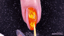 a close up of a nail with the words made in animatica visible