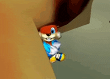 a cartoon character is peeking out of a hole in a wall .