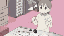 a cartoon of a girl sitting at a table holding a pen