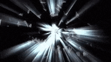 a burst of light is coming out of a hole in a glass window .