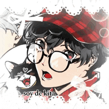 a boy wearing glasses and a plaid hat is holding a cat .