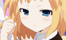 a girl with blonde hair and blue eyes looks angry