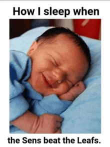 a baby is smiling while sleeping with the words how i sleep when the sens beat the leaves