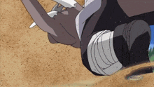 a person laying on the ground with a bandage around their leg