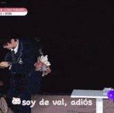 a man riding a bike with the words soy de val adios on the bottom right