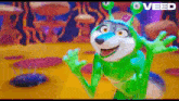 a cartoon character is wearing a green alien costume and smiling .