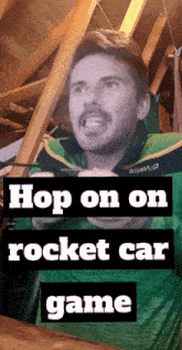 a man in a green jacket is holding a remote control with the words hop on on rocket car game above him