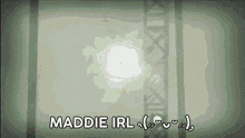 maddie irl is written in white on a gray background