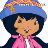 a cartoon girl wearing a blue hat with a gingerbread man on it and the words tokingheads above her