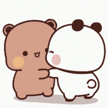 a couple of bears are hugging each other .