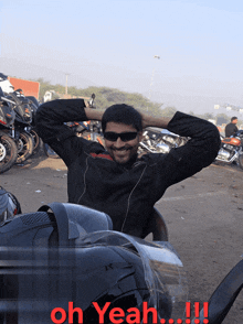 a man sitting in front of a row of motorcycles with the caption oh yeah