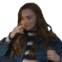 a woman wearing a striped shirt and a denim jacket is covering her mouth with her hand