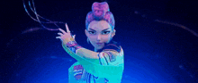 a woman with pink hair and a bun is holding a glowing object in her hand .