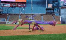 a baseball field with a sign that says aaak on it