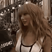 Taylor Laughing Hand On Face GIF - Taylor Laughing Hand On Face GIFs
