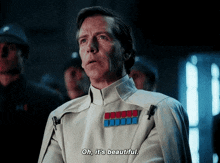 a man in a white uniform is saying oh it 's beautiful .