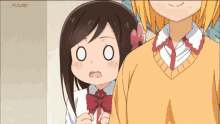 a couple of anime girls standing next to each other