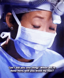 a surgeon wearing a mask and head light says can i ask you one thing when we 're done here