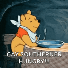 a cartoon of winnie the pooh sitting at a table with a bowl of food