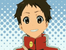a boy with a smiley face on his collar is smiling