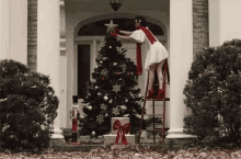 Presents Under The Tree Decorating Outside GIF