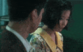 a man and a woman looking at each other