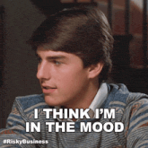 a man says " i think i 'm in the mood " while wearing a striped sweater
