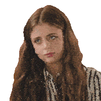 a woman with long hair wearing a striped shirt looks at the camera