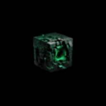 a white circle with a picture of a skull in it on a black background .
