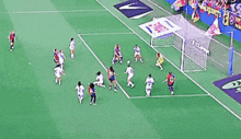 a group of soccer players on a field with a banner that says ' samurai '