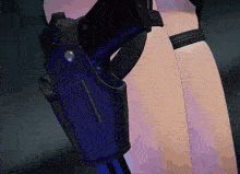 a close up of a person holding a gun in their holster