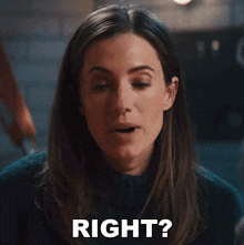 a woman in a green sweater is making a face and says right