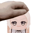 a hand is putting a slipper on a stuffed animal 's head .