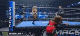 two women wrestling in a wrestling ring on saturday june 7